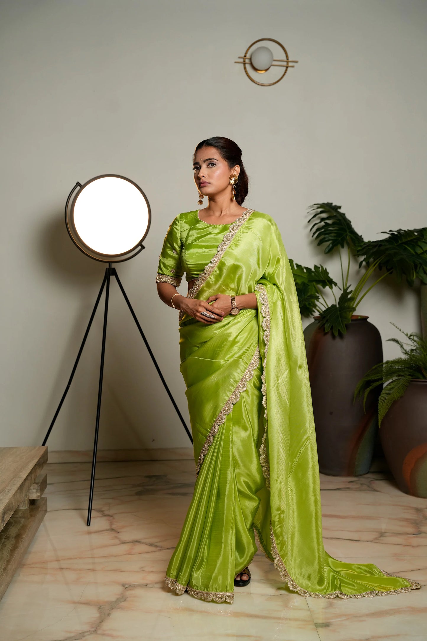 Light Green Woven Pure Tissue Silk Saree with Heavy Golden Embroidery Border