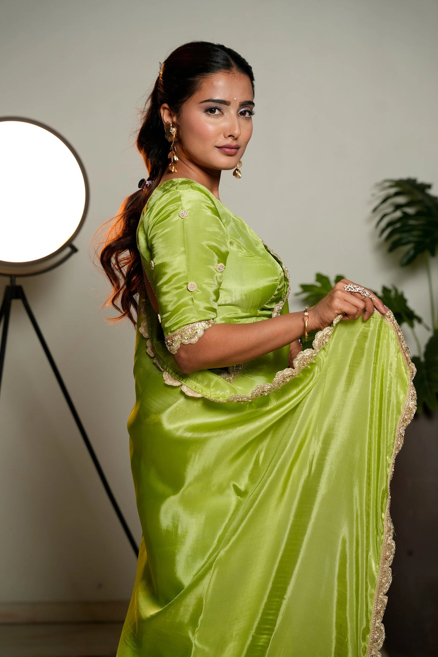 Light Green Woven Pure Tissue Silk Saree with Heavy Golden Embroidery Border