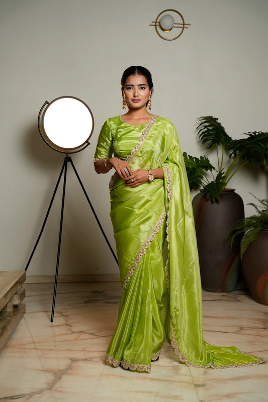 Light Green Woven Pure Tissue Silk Saree with Heavy Golden Embroidery Border