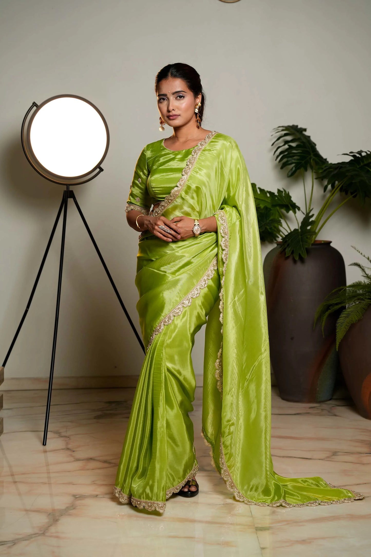 Light Green Woven Pure Tissue Silk Saree with Heavy Golden Embroidery Border