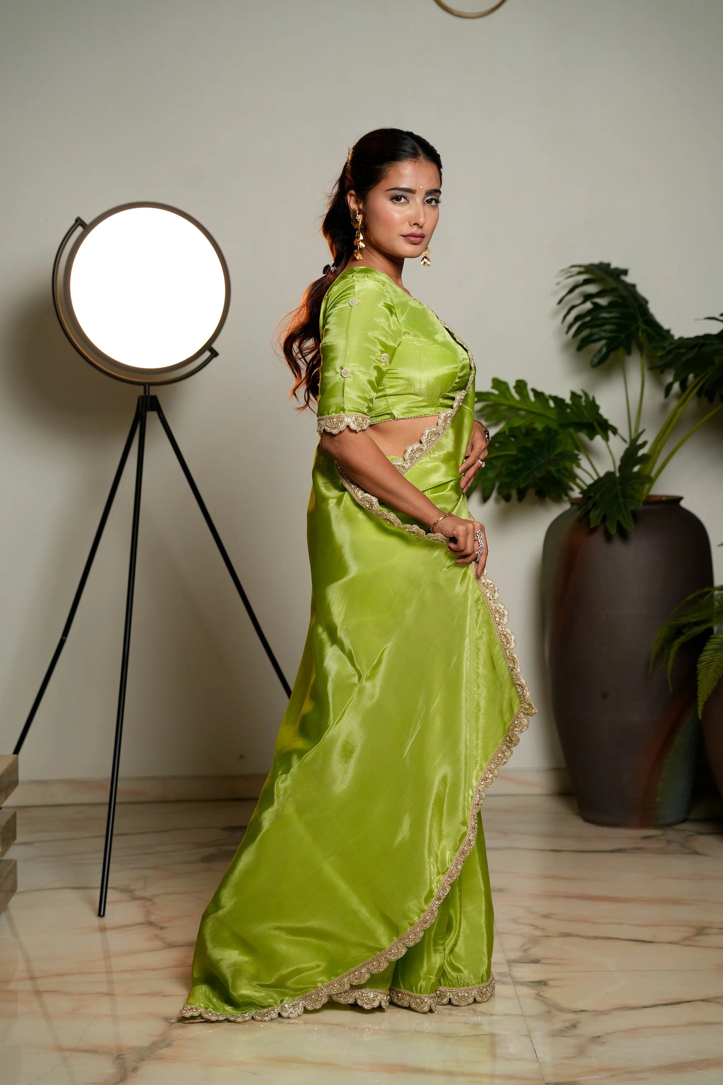 Light Green Woven Pure Tissue Silk Saree with Heavy Golden Embroidery Border