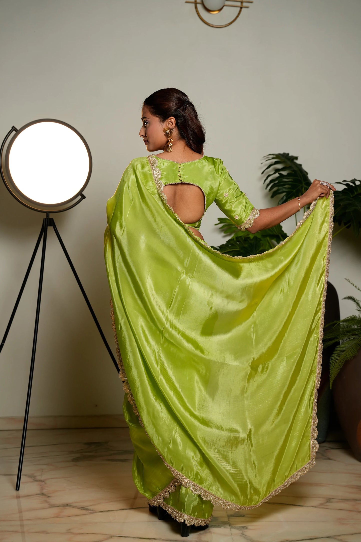 Light Green Woven Pure Tissue Silk Saree with Heavy Golden Embroidery Border